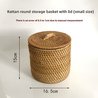 A round woven rattan storage basket with lid in a small size, shown on a white background with dimension labels indicating 15 cm height and 16.5 cm width, plus text noting a 0.