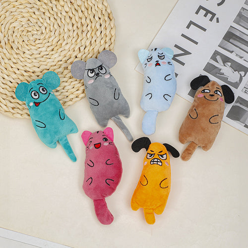 Set of colorful plush toys shaped like animals on a textured surface.